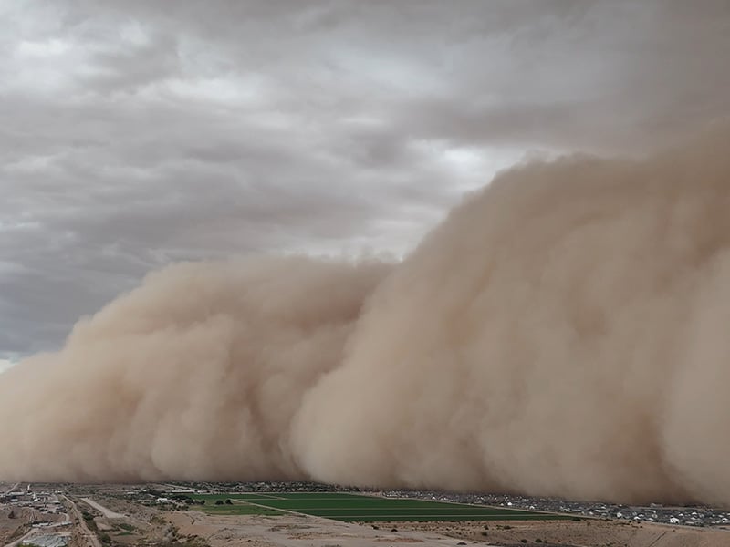sand storm sweeping over city